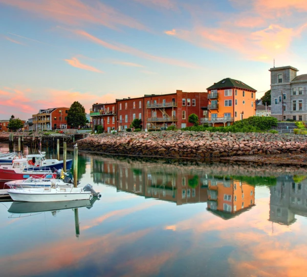 The waterfront of Eastport, Maine, during a colorful sunset.