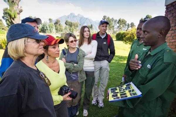 A group of travelers learn more about gorillas
