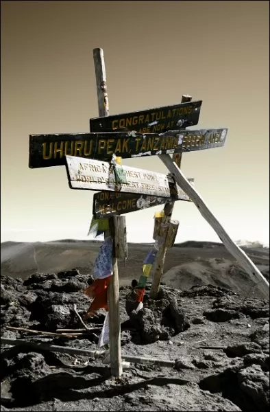 Marker at the top of Mount Kilimanjaro