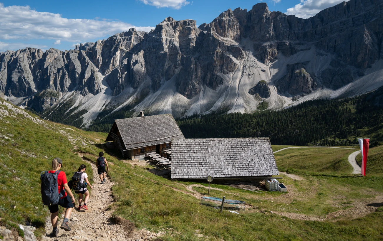 Friends hiking on the Dolomites; outdoor adventures