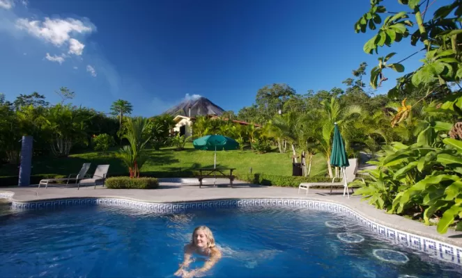 Swim with full views of Arenal Volcano at Arenal Volcano Inn