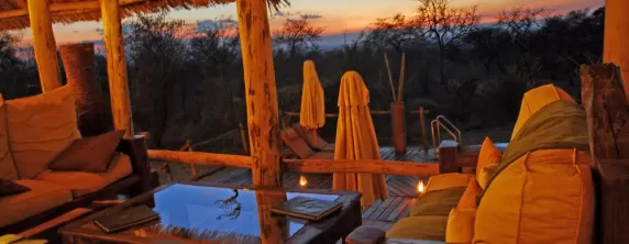 Enjoy the sunset from the open porch at Tarangire Treetops Lodge