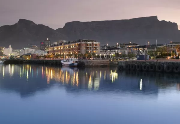 A night shot of the Cape Grace Hotel in Cape Town