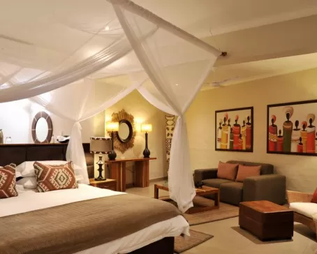 Victoria Falls Safari Club's spacious rooms decorated to reflect the culture of Africa.