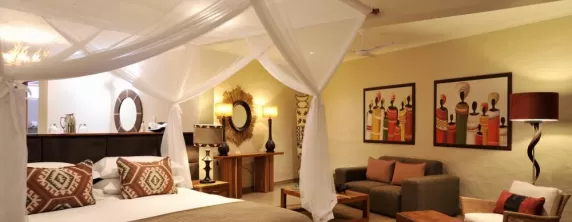 Victoria Falls Safari Club's spacious rooms decorated to reflect the culture of Africa.