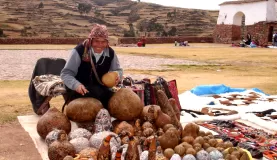 Skilled craftsman outside of the market in Chinchero, Peru