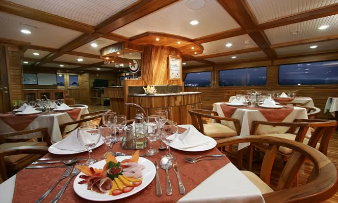 Enjoy fine dining aboard the Galaxy on your Galapagos cruise