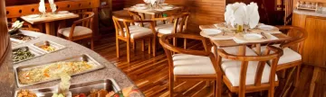 Enjoy fine dining aboard the Galaxy on your Galapagos cruise