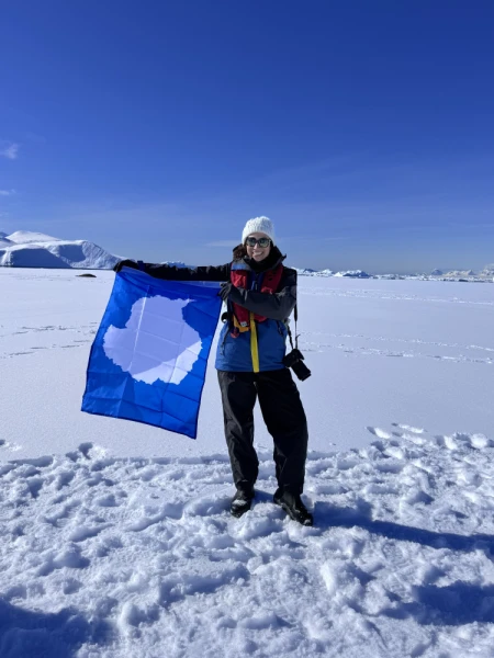 Trip Planner Claudia showing a flag with Antarctica region on it.