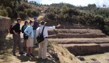 Listening to our guide, Marco, near the Inca ruins of Sacsayhuaman