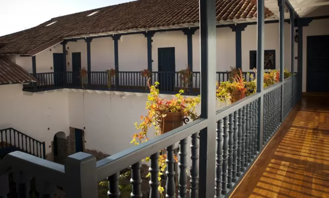 Admire the courtyard of Palacio Nazarenas from the deck