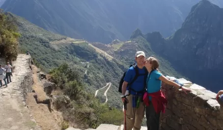 Celebrating with a kiss at the Sun Gate - entrance to Machu Picchu