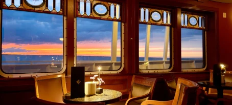 Sunset in the tavern aboard Victory I, Great Lakes