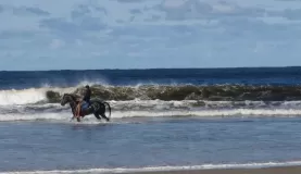 Riding in the surf
