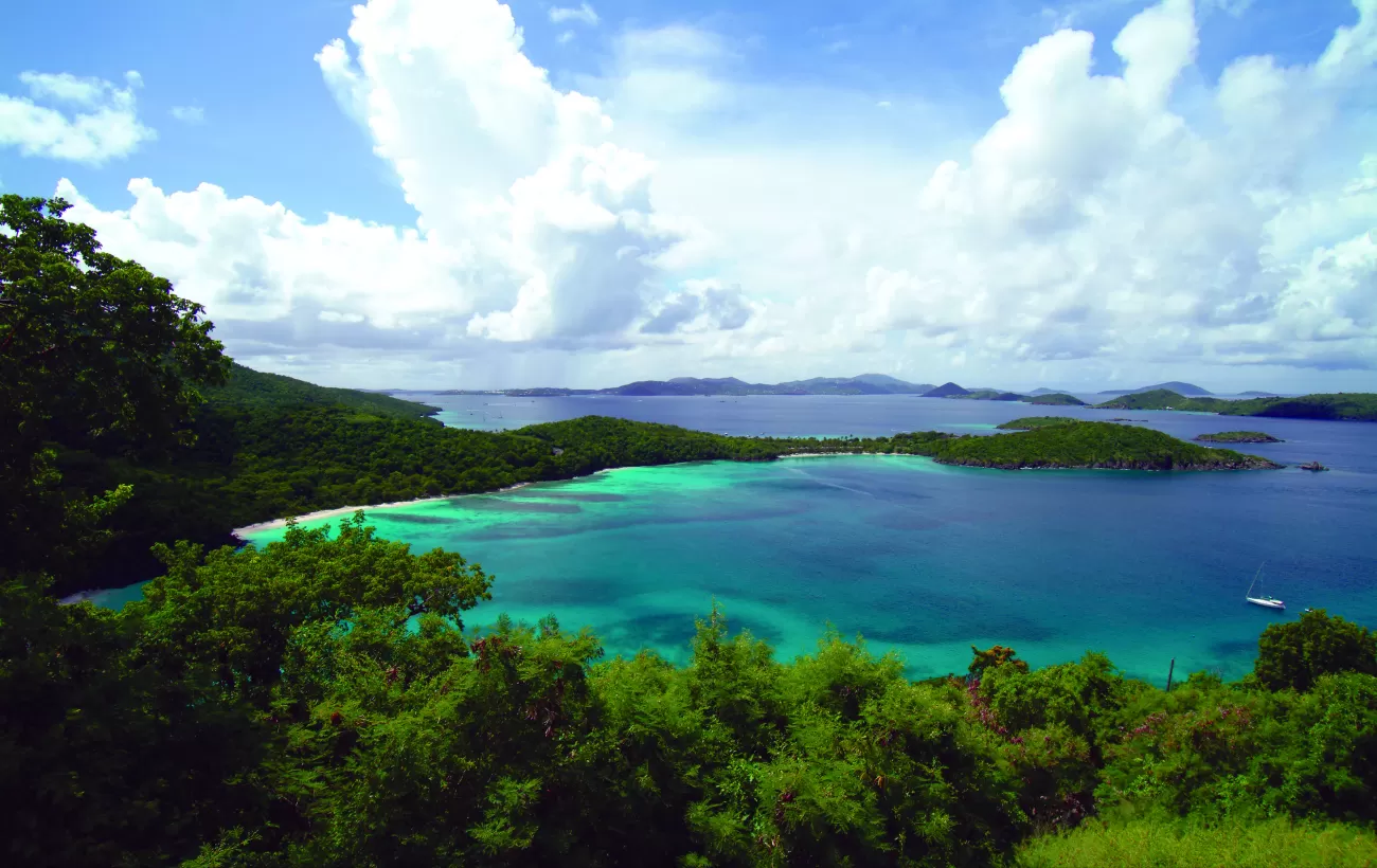 Experience the stunning shades of blue as you sail through the Caribbean