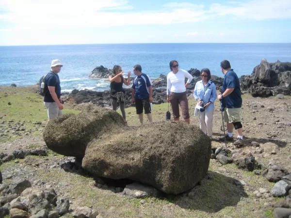 Examine the fallen Moai as you explore the island