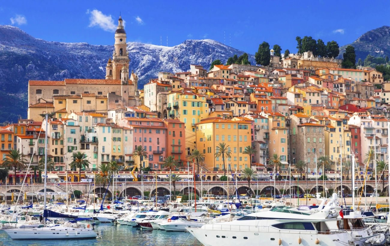 Panoramic Menton, France, with colorful hillsides and a premier yacht harbor