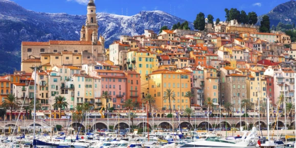 Panoramic Menton, France, with colorful hillsides and a premier yacht harbor