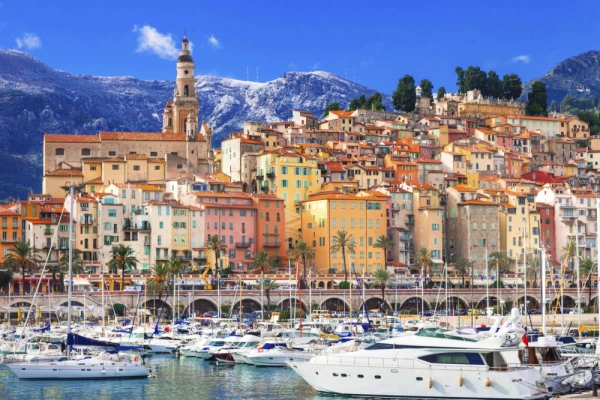 Panoramic Menton, France, with colorful hillsides and a premier yacht harbor
