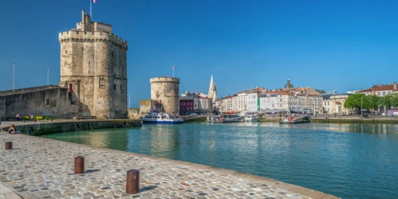 Explore La Rochelle’s historic Vieux Port, with its stone towers and waterfront promenade