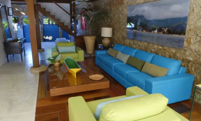 Relax in the comfortable lounge at Pousada Casa da Turquesa