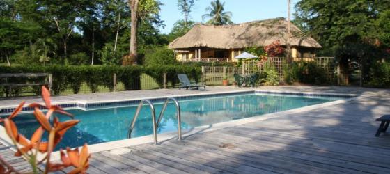 A view of the main lodge and pool at the Lodge at Big Falls