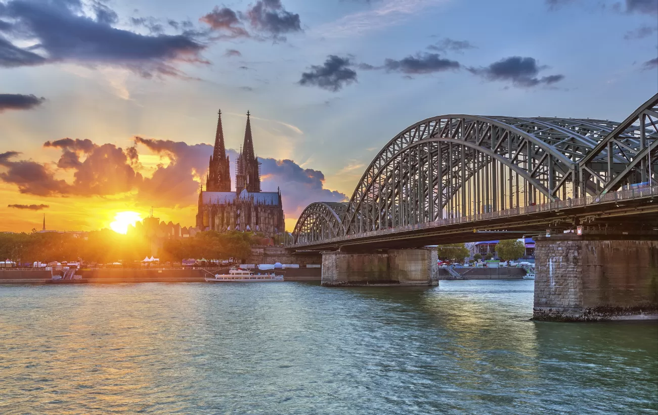 Cologne's famous cathedral at sunset from the Rhine.