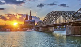 Cologne's famous cathedral at sunset from the Rhine.