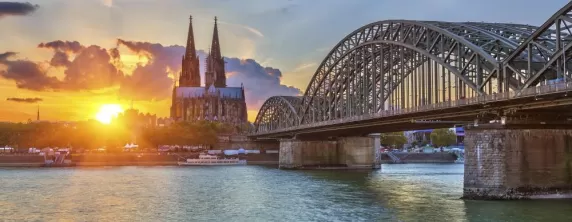 Cologne's famous cathedral at sunset from the Rhine.