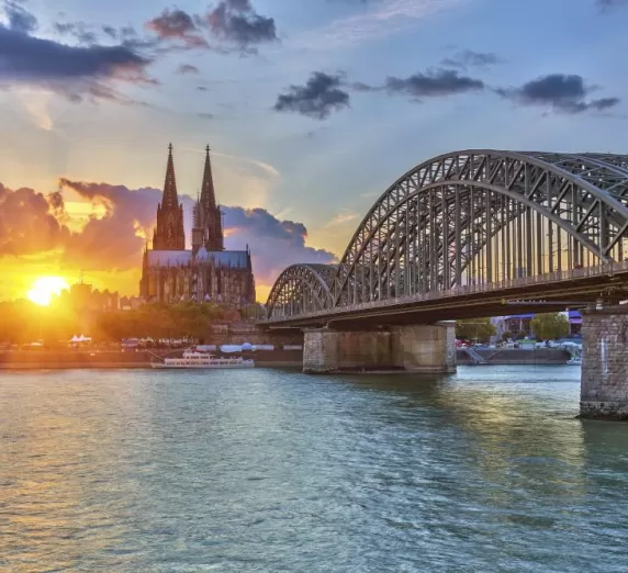 Cologne's famous cathedral at sunset from the Rhine.