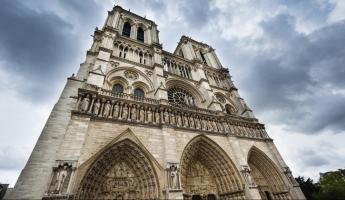 The gothic Notre-Dame Cathedral towers over the streets of Paris