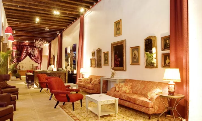 Relax in the luxurious lobby at Pousada do Convento do Carmo