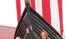 Holly & I hold up the Norse boat