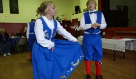 Boys describe meaning of the girls embroidered skirts