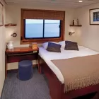 Commander Stateroom aboard the Safari Voyager.