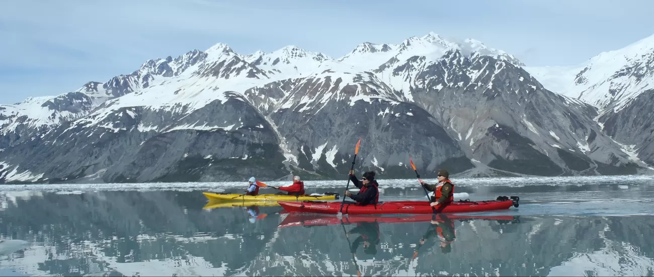 Kayaking through Alaska.