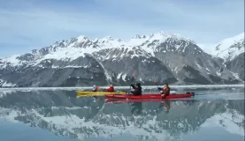 Kayaking through Alaska.