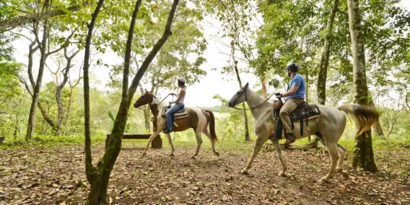 Horseback riding through the jungle at the Lodge at Chaa Creek