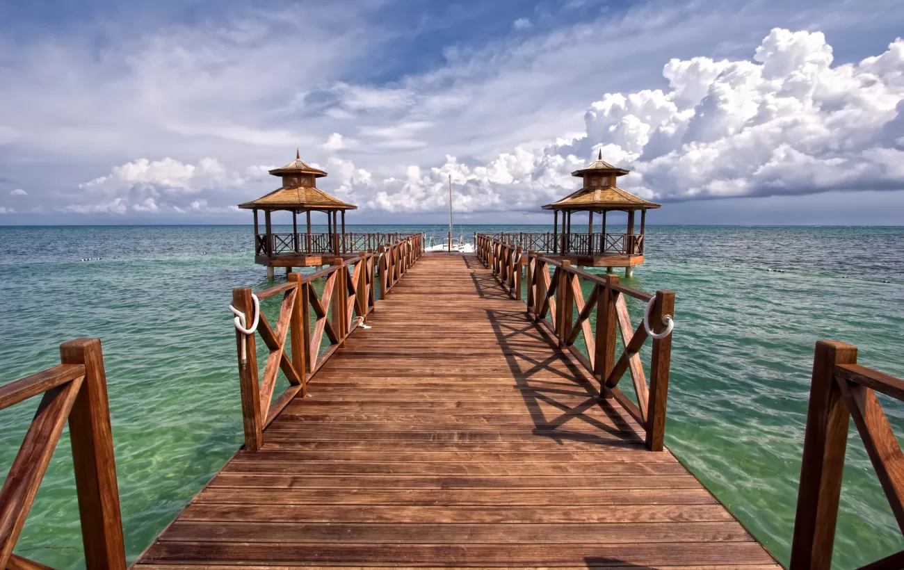 Dock going out into the crystal blue ocean