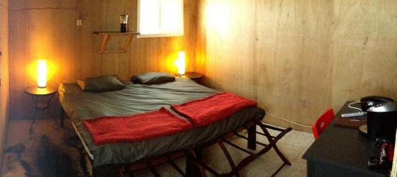 Your guest room at Arctic Kingdom's Polar Bear Cabins is warm and comfortable