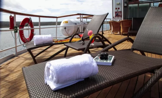 Relax on the sun deck of the Isabela II.