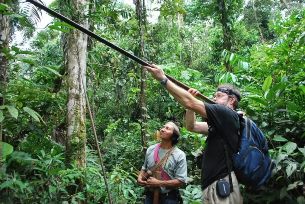 Learning to shoot a blow dart at Huaorani Lodge