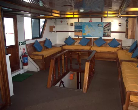 Relax in the lounge area aboard the Darwin.
