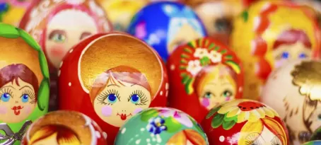 A cluster of multicolored matryoshka dolls.