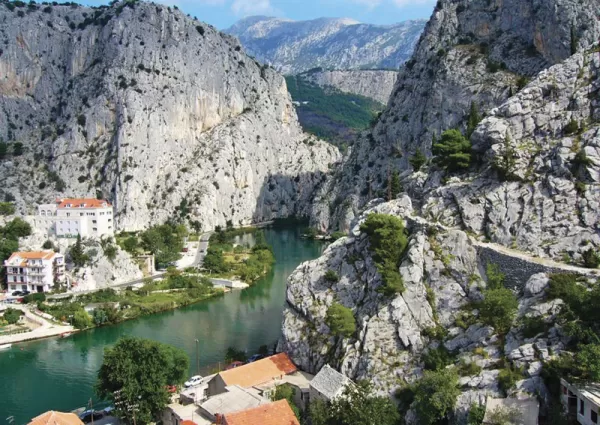 Explore the rugged coastline of Omis on your bike and cruise tour around Croatia