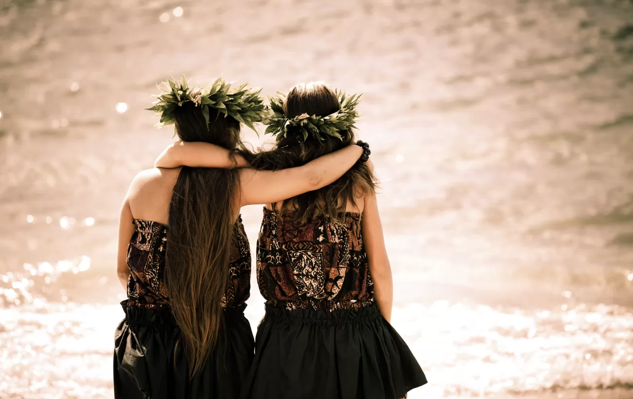 Women wearing traditional dress of the South Pacific.