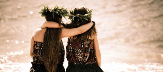 Women wearing traditional dress of the South Pacific.