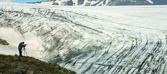 Traveler photographing the Jokulsarlon Glacier.