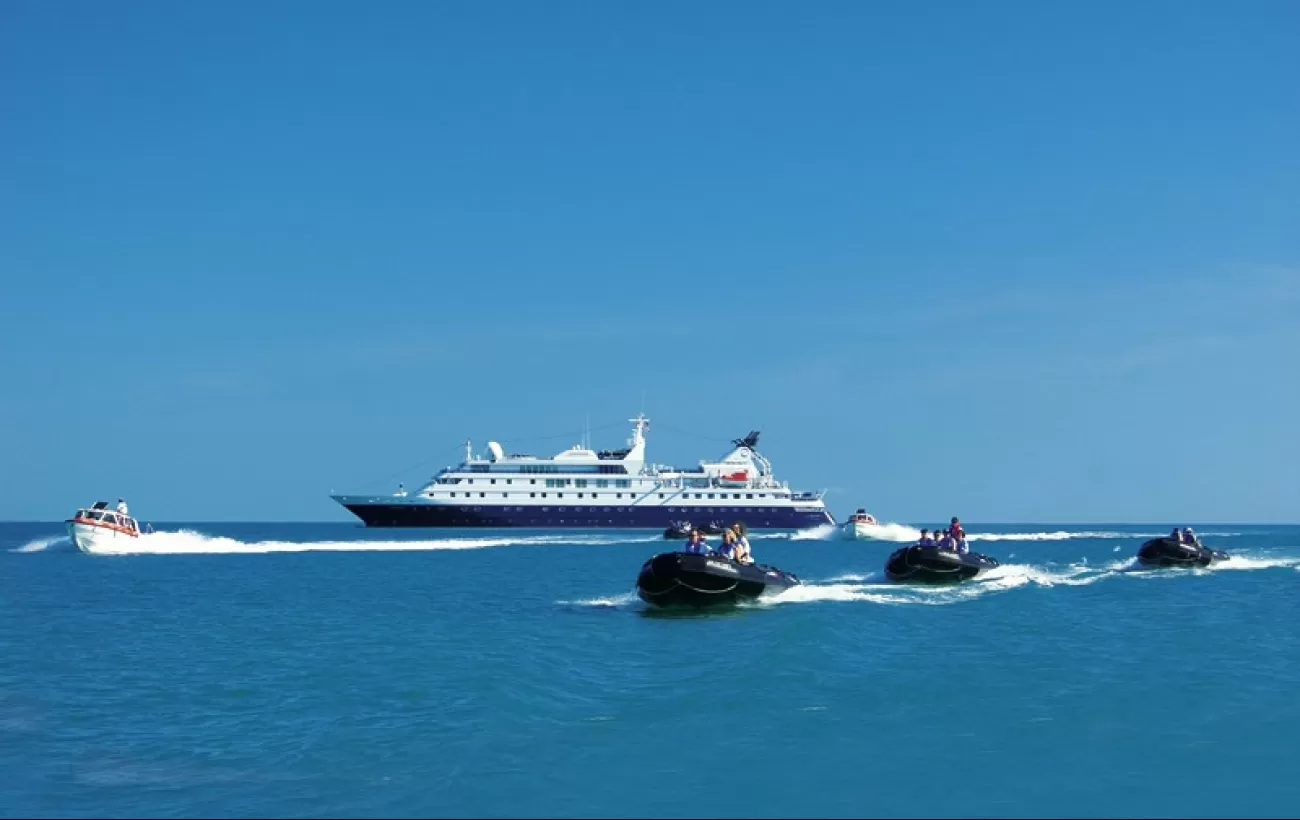 Travel by Zodiac to land on exotic shores while on your Orion cruise