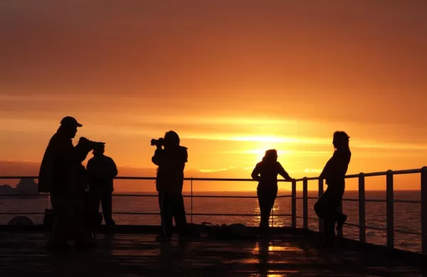 Taking pictures of the beautiful sunset from the ship.